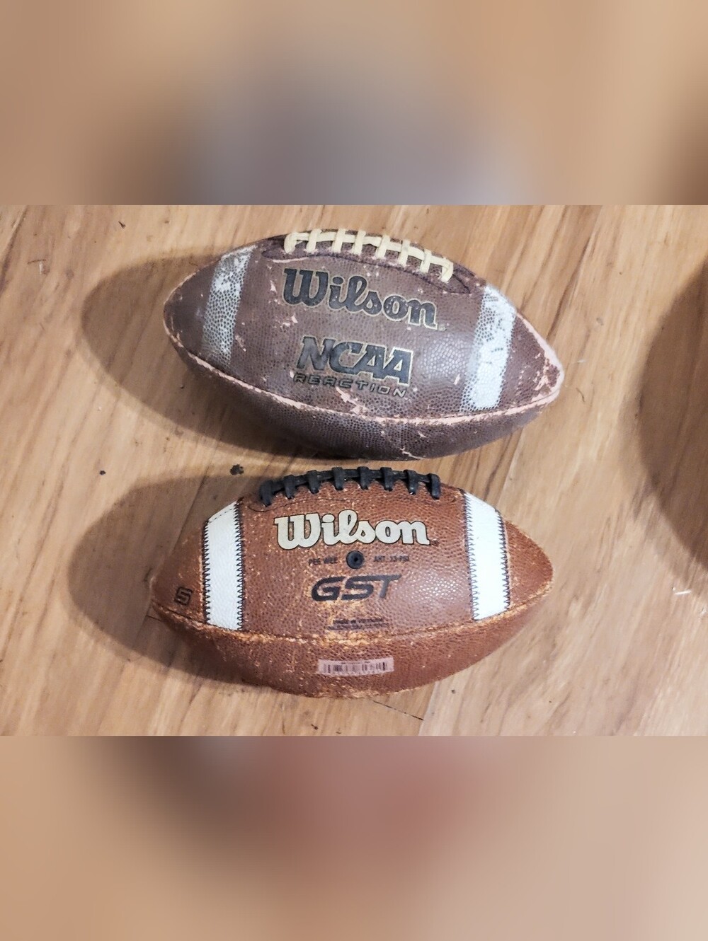 Wilson GST Leather Football Pee Wee Size And Wilson NCAA Reaction Junior Size